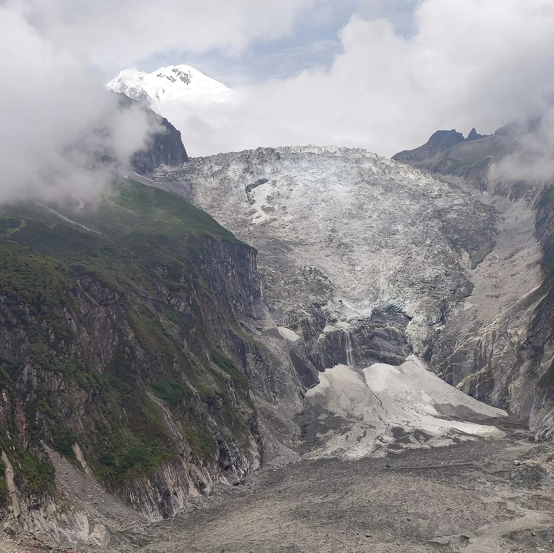 Close view of Hailuogou Glacier beneath the snowy Gongga mountain landscape