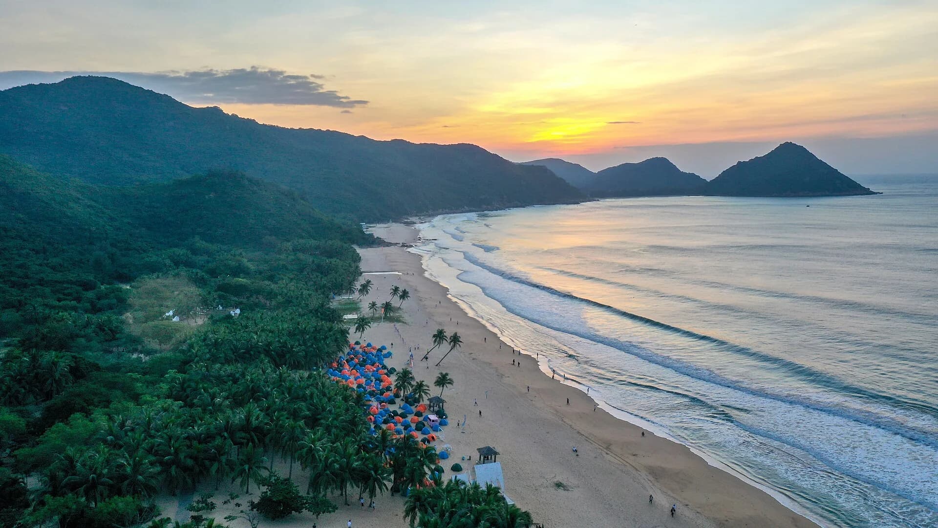 Tropical beach and sunrise on the Lingshui coast