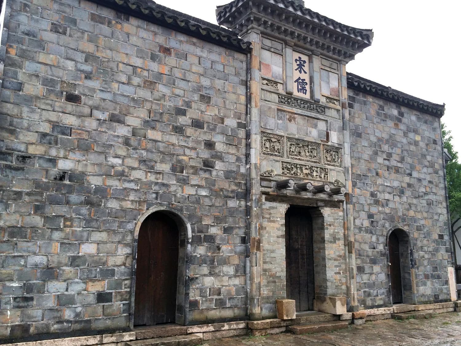 Historic hall and stone courtyard in Huishan Ancient Town
