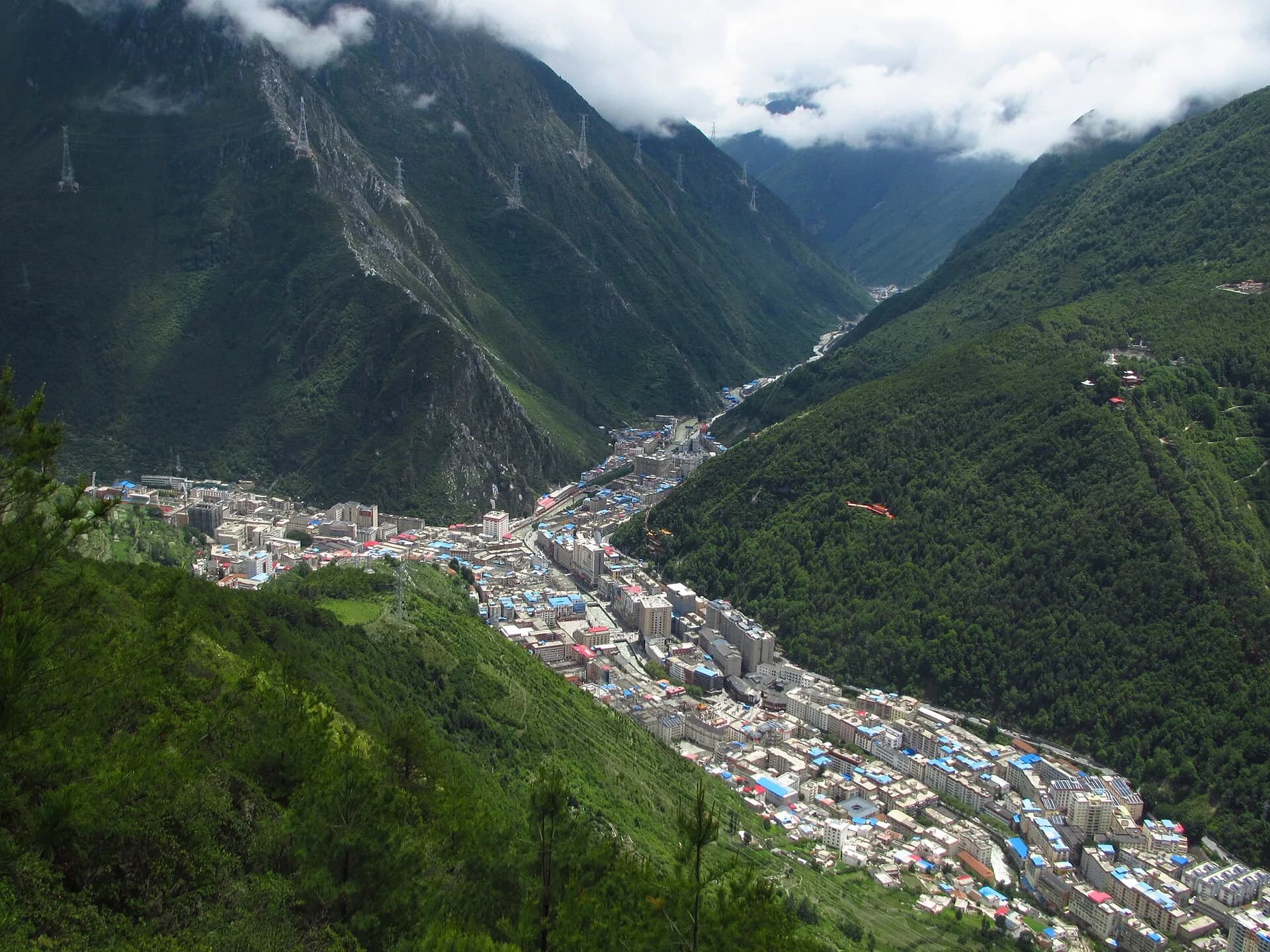 Kangding's river city centre filling a steep mountain valley
