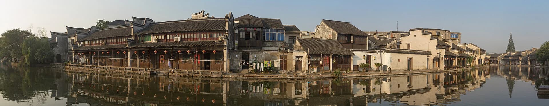 Wide view of Baijianlou residences along the canal in Nanxun