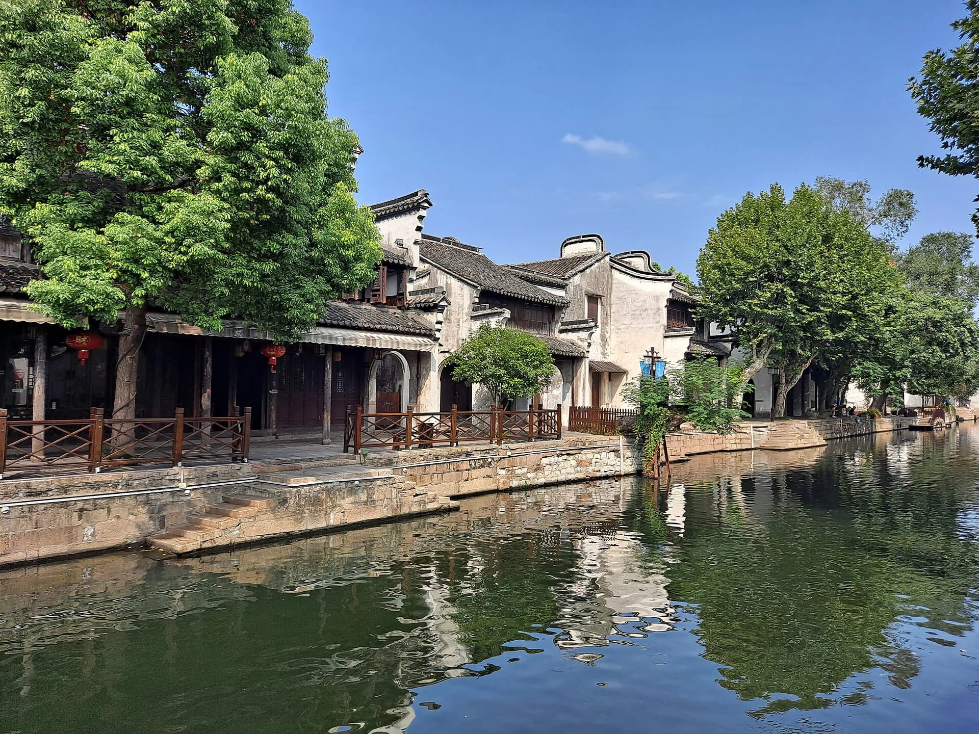 Canal, stone bridge and white-walled houses in Nanxun Ancient Town