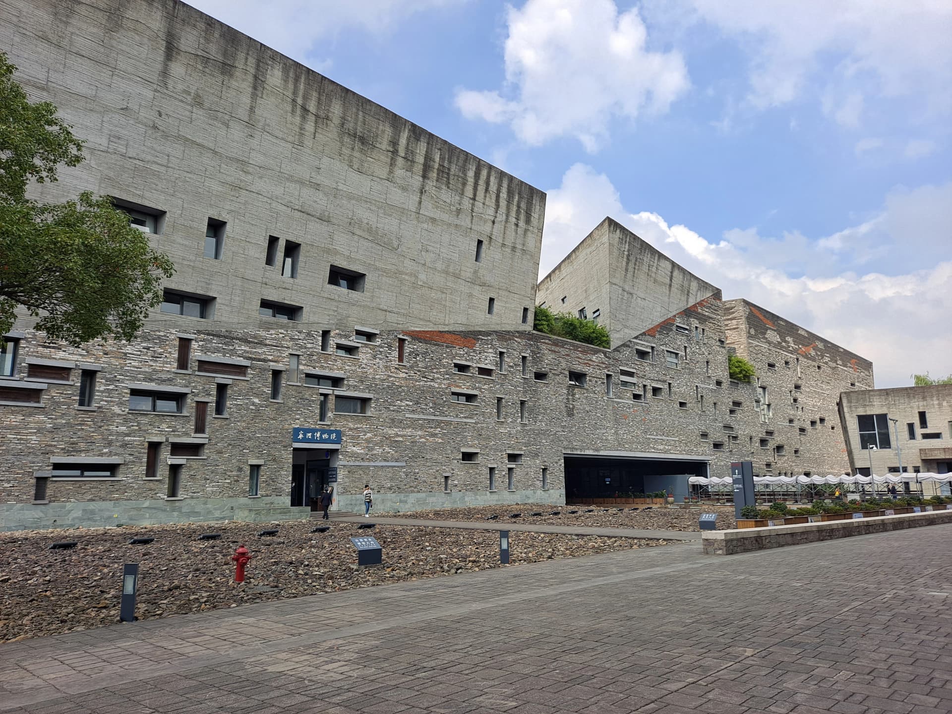 Reused tile and brick surfaces on the facade of Ningbo Museum