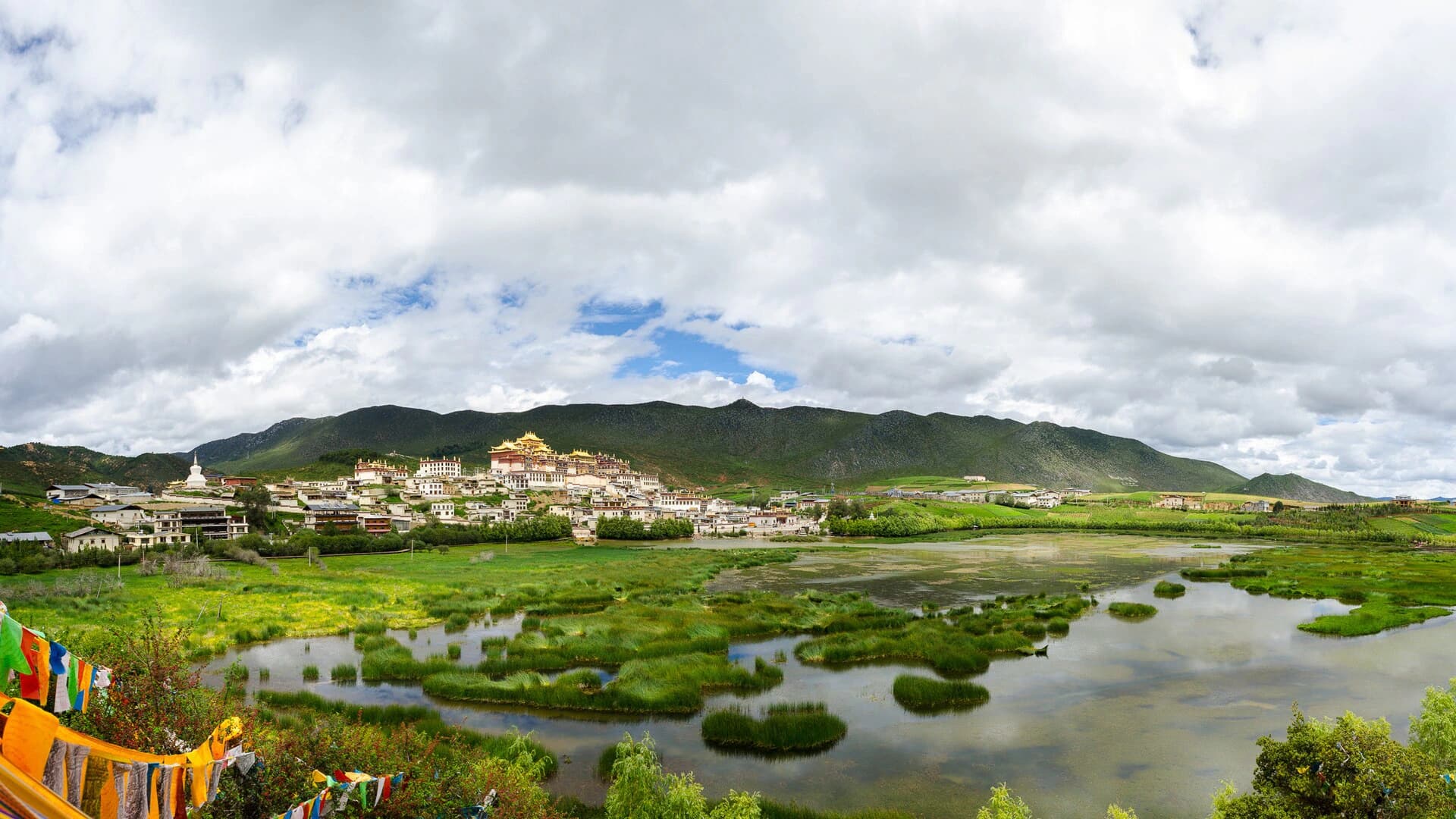 Wide architectural view of Ganden Sumtseling Monastery