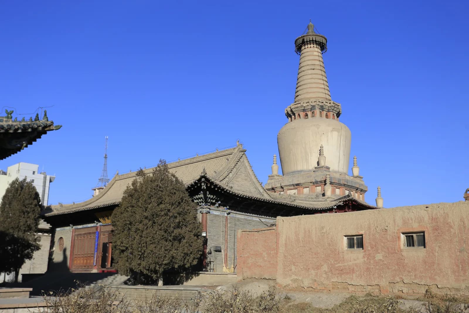 Earthen pagoda and historic roofs at Zhangye Giant Buddha Temple